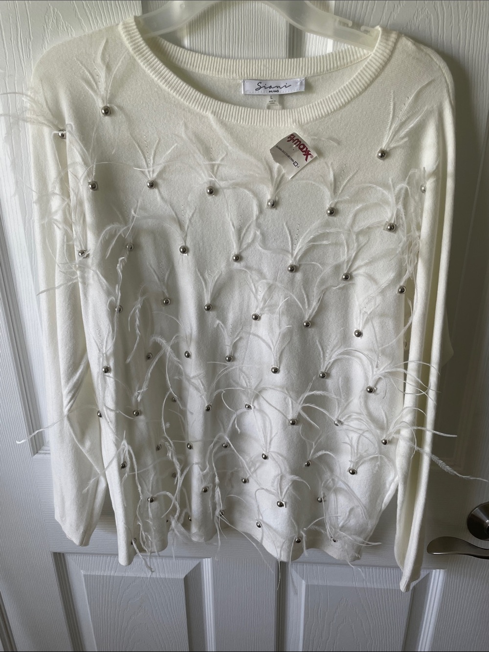 Brand new sweater with silver application and feathery